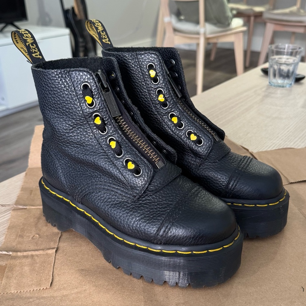 Dr. Martens Sinclair Milled Nappa Leather Platform Boots with yellow heart laces